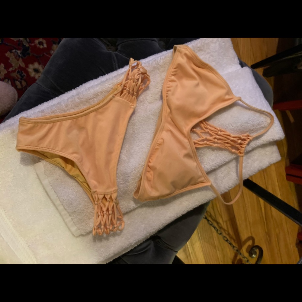 Size 2 yellow bikini tags removed